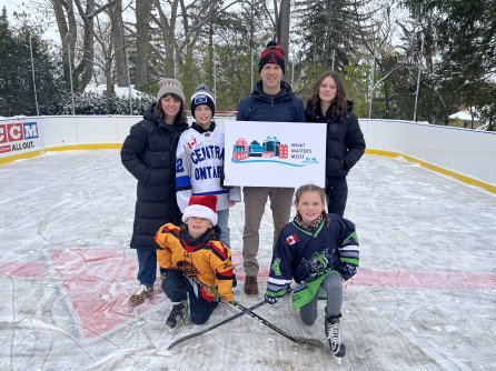 Holiday  Appeal  Todd  Family with sign.5 content images